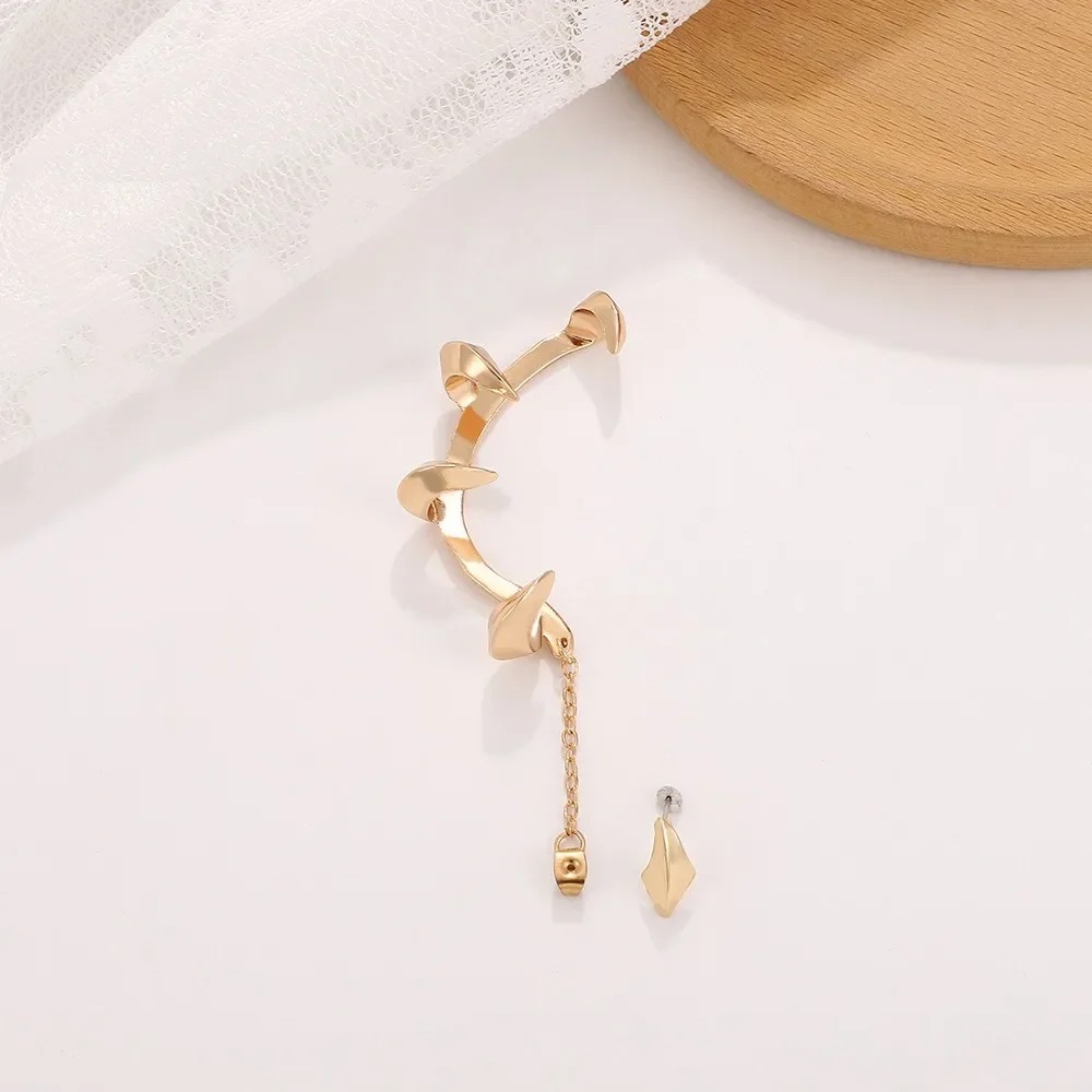 Dark Demon Sharp Teeth Ear Cli - Street Fashion Earrings recension och pris